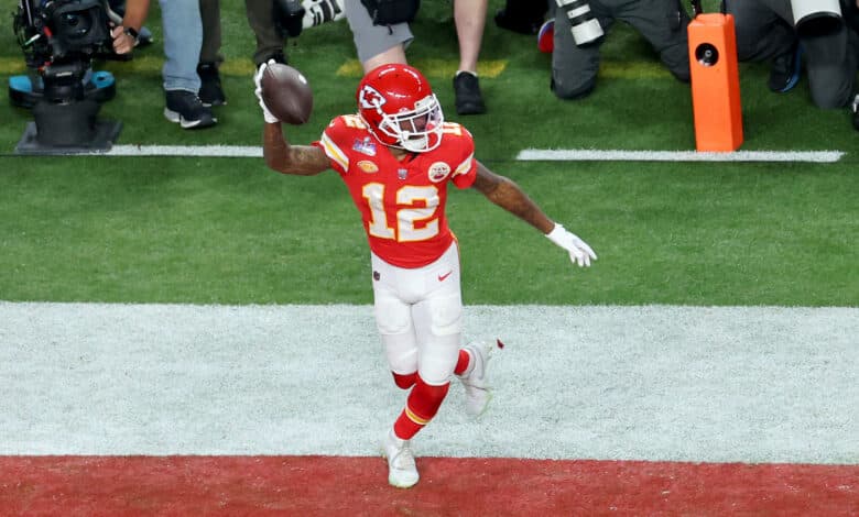 LAS VEGAS, NEVADA - FEBRUARY 11: Mecole Hardman Jr. #12 of the Kansas City Chiefs celebrates after catching the game-winning touchdown in overtime to defeat the San Francisco 49ers 25-22 during Super Bowl LVIII at Allegiant Stadium on February 11, 2024 in Las Vegas, Nevada.