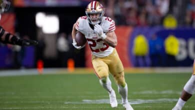 LAS VEGAS, NV - FEBRUARY 11: Christian McCaffrey #23 of the San Francisco 49ers heads to the end zone on a 21-yard touchdown catch during Super Bowl LVIII against the Kansas City Chiefs at Allegiant Stadium on February 11, 2024 in Las Vegas, Nevada. The Chiefs defeated the 49ers 25-22.
