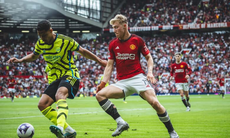Rasmus Hojlund of Manchester United in action with William Saliba of Arsenal FC