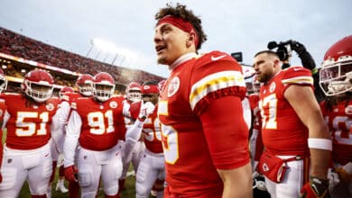 KANSAS CITY, MISSOURI - JANUARY 29: Patrick Mahomes #15 of the Kansas City Chiefs leads a huddle prior to the AFC Championship NFL football game between the Kansas City Chiefs and the Cincinnati Bengals at GEHA Field at Arrowhead Stadium on January 29, 2023 in Kansas City, Missouri.