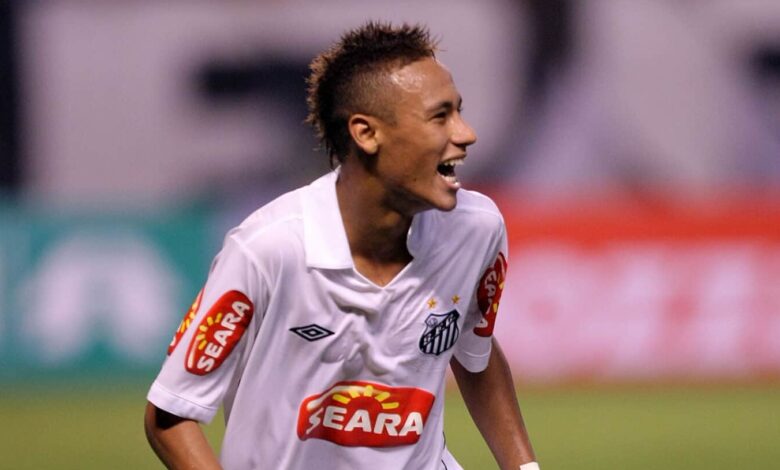 Neymar of Santos celebrates scored goal during a match against Botafogo