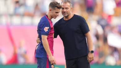 Hansi Flick, Head Coach of FC Barcelona, interacts with Fermin Lopez of FC Barcelona following the La Liga match.