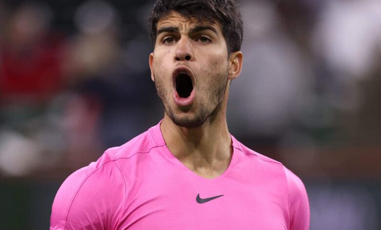 INDIAN WELLS, CALIFORNIA - MARCH 16: Carlos Alcaraz of Spain celebrates defeating Felix Auger-Aliassime of Canada in the quarter finals during the BNP Paribas Open on March 16, 2023 in Indian Wells, California.