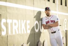 FORT MYERS, FLORIDA - FEBRUARY 18: Garrett Crochet #35 of the Boston Red Sox poses for a portrait in front of the Green Monster during 2025 Boston Red Sox Spring Training at JetBlue Park at Fenway South in Fort Myers, Florida on February 18, 2025.