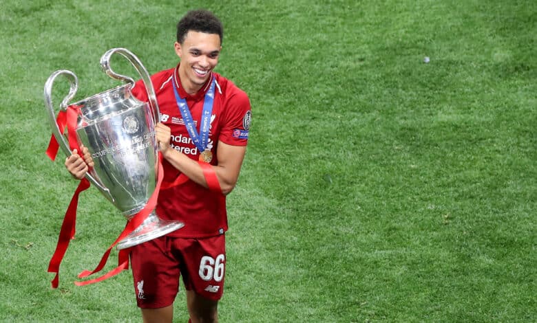 MADRID, SPAIN - JUNE 01: A smiling Trent Alexander-Arnold of Liverpool with the trophy during the UEFA Champions League Final between Tottenham Hotspur and Liverpool at Estadio Wanda Metropolitano on June 1, 2019 in Madrid, Spain.