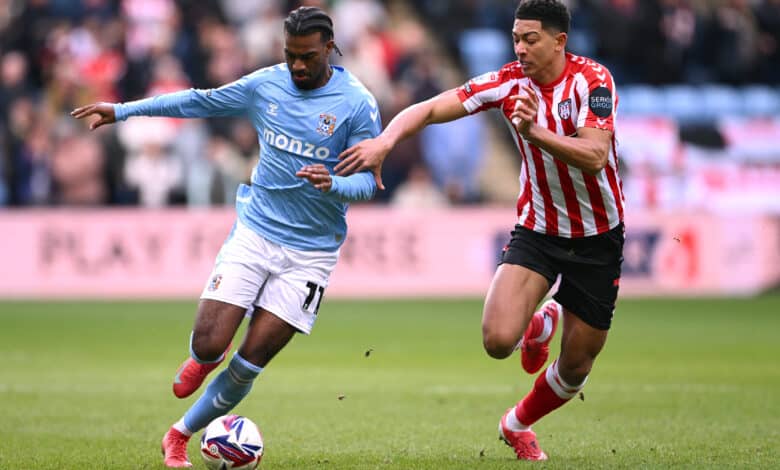 Haji Wright of Coventry City holds off the challenge of Jobe Bellingham of Sunderland