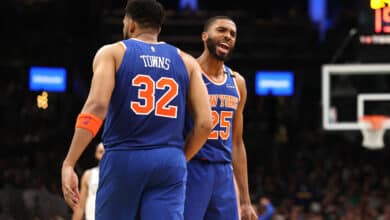 Mikal Bridges #25 of the New York Knicks celebrates with Karl-Anthony Towns #32 during the second half against the Boston Celtics