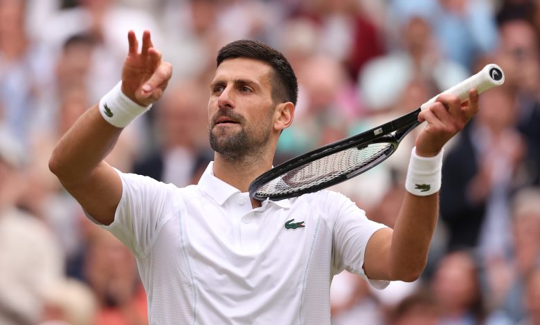 Novak Djokovic of Serbia celebrates winning match point with a violin gesture against Lorenzo Musett