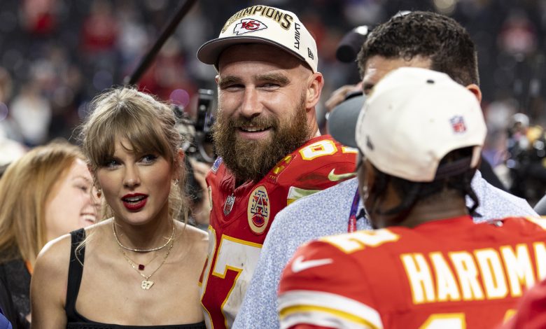 LAS VEGAS, NEVADA - FEBRUARY 11: Travis Kelce #87 of the Kansas City Chiefs and Taylor Swift react as they see Mecole Hardman Jr. #12 of the Kansas City Chiefs following the NFL Super Bowl 58 football game between the San Francisco 49ers and the Kansas City Chiefs at Allegiant Stadium on February 11, 2024 in Las Vegas, Nevada.