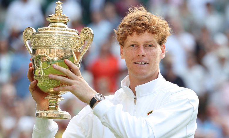 LONDON, ENGLAND - JULY 13: Jannick Sinner (ITA) [1] with the winner's trophy after winning his Gentlemen's Singles Final match against Carlos Alcaraz (ESP) [2] during day fourteen of The Championships Wimbledon 2025 at All England Lawn Tennis and Croquet Club on July 13, 2025 in London, England.