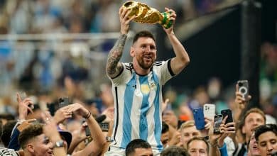 Lionel Messi of Argentina lifts the trophy