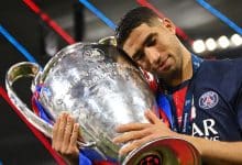 MUNICH, GERMANY - MAY 31: Achraf Hakimi of Paris Saint-Germain celebrates with the UEFA Champions League trophy after his team's victory, to secure Paris Saint-Germain's first ever UEFA Champions League title in the club's history and a record UEFA Champions League Final winning scoreline of 5-0, following the UEFA Champions League Final 2025 between Paris Saint-Germain and FC Internazionale Milano at Munich Football Arena on May 31, 2025 in Munich, Germany.